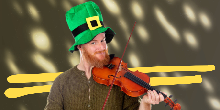 Hombre con sombrero de duende tocando Uno de los Instrumentos Irlandeses